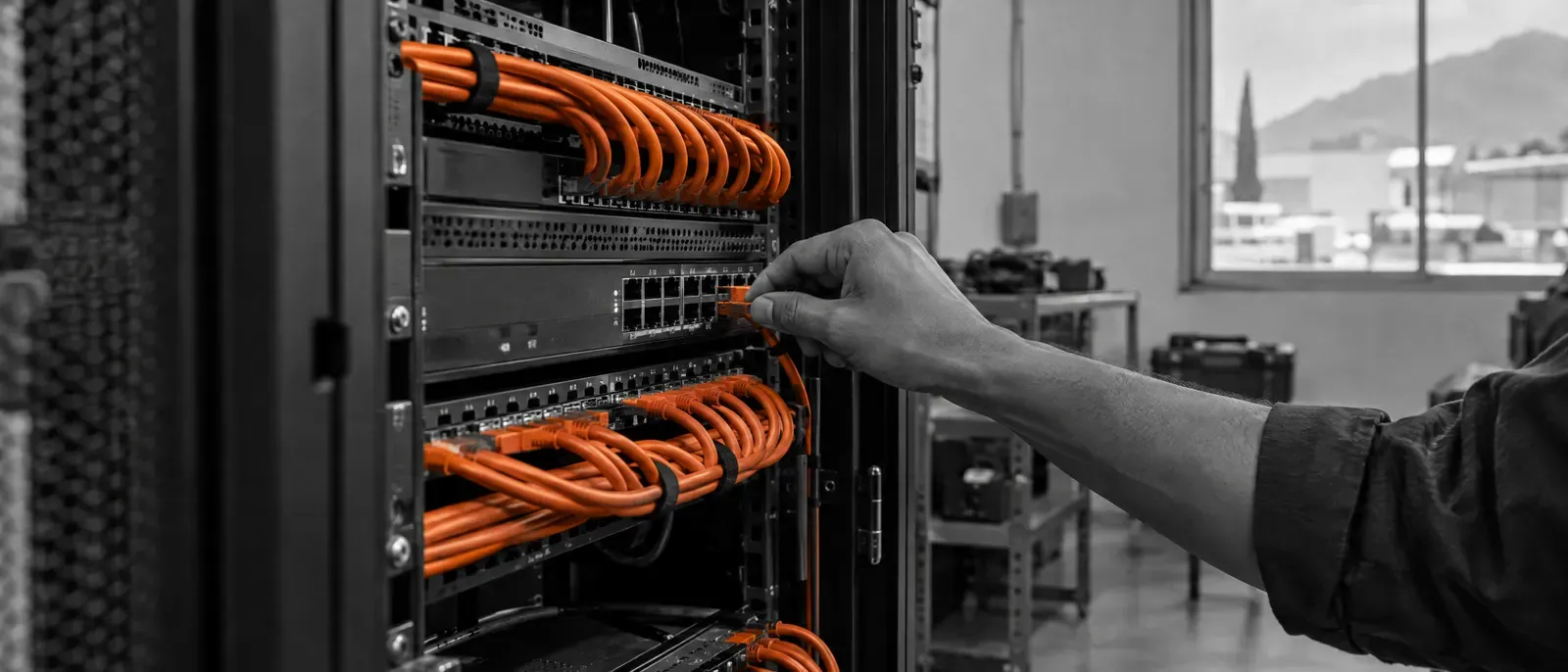 IT manager checking a server rack